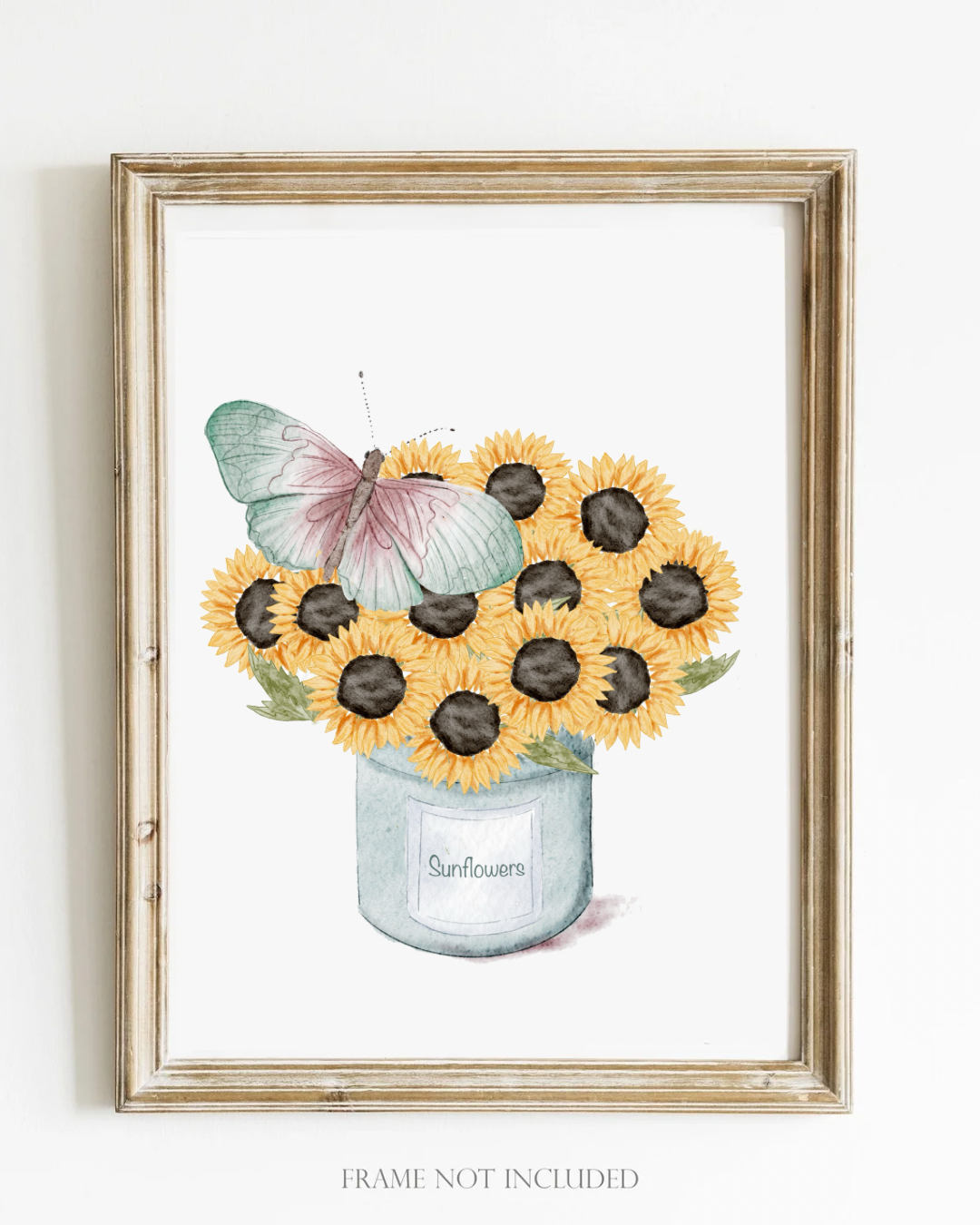 Framed artwork of sunflowers in a jar with a butterfly on a white background